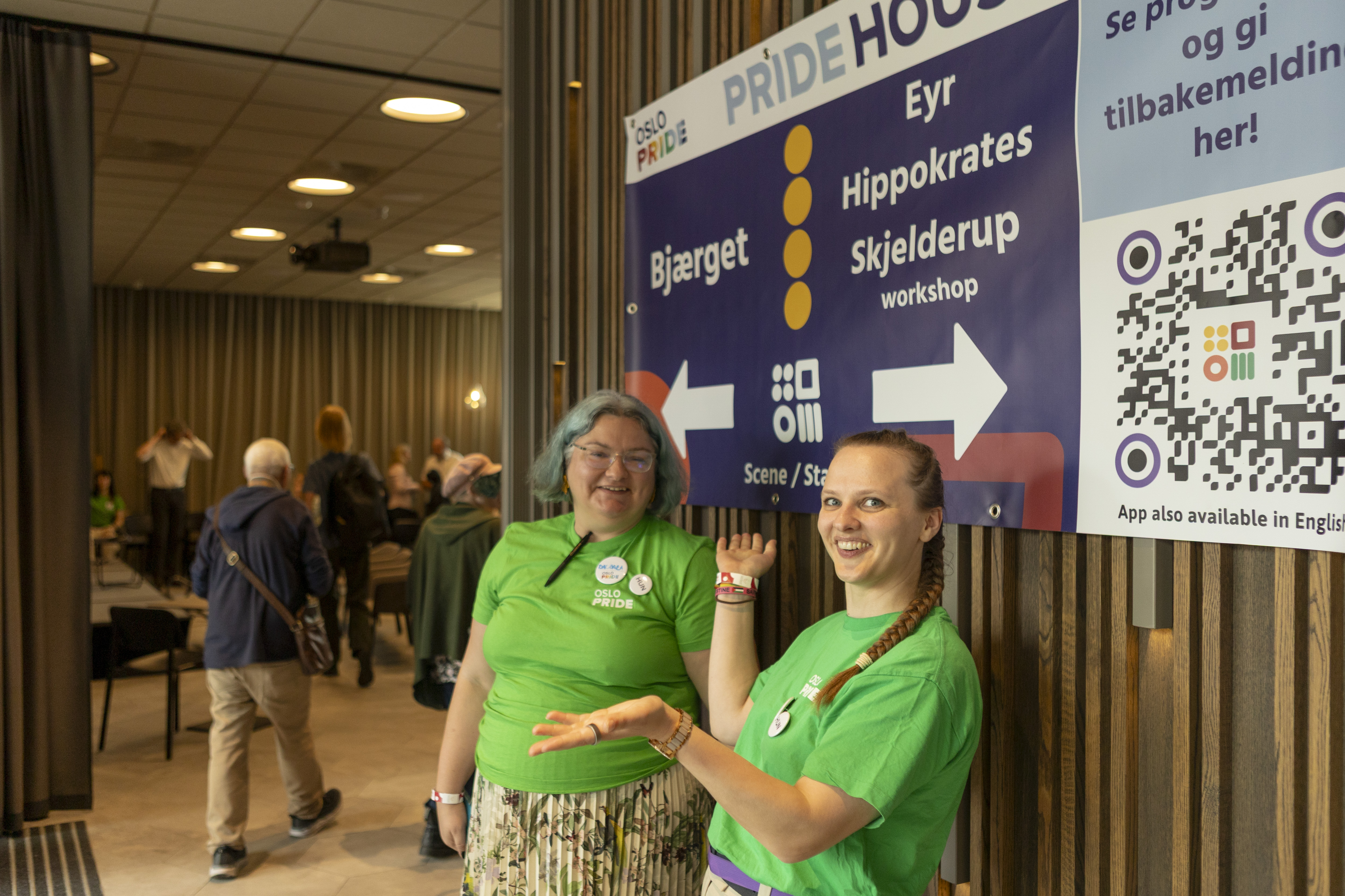 Large QR code display at Oslo Pride House entrance for event information access